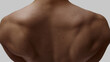 © master1305 - Rear view of male back with natural shoulder anatomy and freckles. Concept of modern masculinity, body identity, and wellness care.