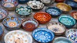 © ABDUL - Colorful Handcrafted Ceramic Bowls Displayed in Artisan Market
