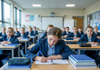 © Michal Przystas - Pilna uczennica siedzi w pierwszej ławce i robi notatki w zeszycie, rozpoczęcie roku szkolnego, students in classroom