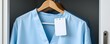 © Guy - New Arrival: A serene image captures the subtle sophistication of a pristine blue shirt elegantly hanging in a closet, perfect for a minimalist aesthetic.