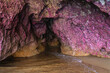 © ADDICTIVE STOCK - Majestic cave with vibrant pink and purple rock textures