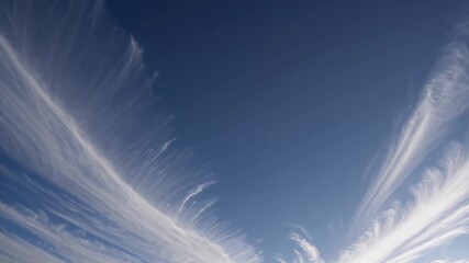 Wall Mural - High altitude 4K video reveals delicate cirrus clouds formed by frozen vapor stretching across a serene sky a perfect depiction of upper atmospheric conditions and weather forecasting visuals