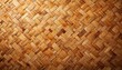 © Pete - Close-up of woven wicker basket texture featuring repeating diagonal pattern of natural bamboo reeds. Hand-made material in shades of brown, tan offers rustic, earthy aesthetic, perfect for