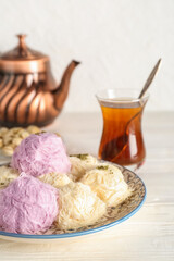 Wall Mural - Plate with tasty Turkish Pismaniye on table