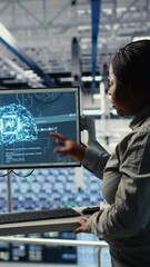 Poster - Vertical video Server room army experts deploy AI tech to modernize defense infrastructure. Military server room colleagues enhancing tactical readiness by integrating artificial intelligence