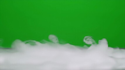 Wall Mural - White Smoke Billowing Over Green Screen Background:  Detailed Footage of Ethereal Vapor Rising and Flowing Dynamically, Creating a Soft, Textured