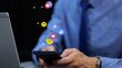 © TechAnimationStock - Businessman on social media. 3D emoji icons like heart and smile float over the phone. Graphic animation