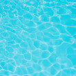 © K-Signature - Clear blue water reflects sunlight, creating serene and tranquil atmosphere. gentle ripples and patterns evoke sense of calm and relaxation, perfect for summer day