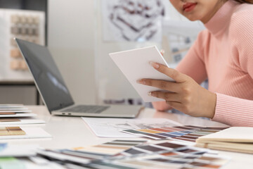 Wall Mural - Creative web designer planning UI application and developing digital template