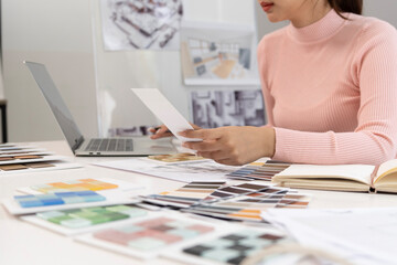 Wall Mural - Creative web designer planning UI application and developing digital template