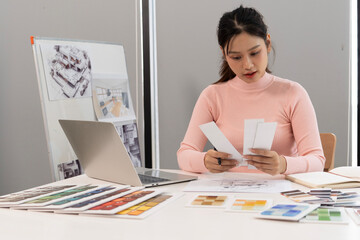 Wall Mural - Creative web designer planning UI application and developing digital template