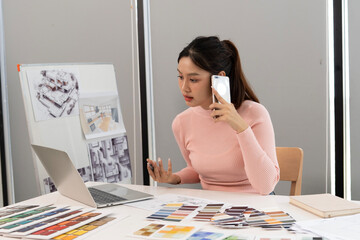 Wall Mural - Creative web designer planning UI application and developing digital template