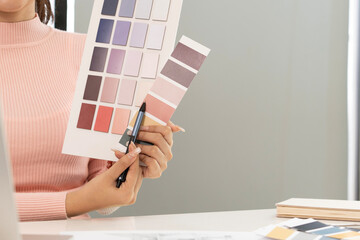 Wall Mural - Creative web designer planning UI application and developing digital template