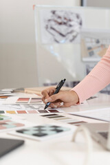 Wall Mural - Creative web designer planning UI application and developing digital template