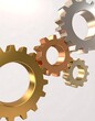 © MZARTT - 3D rendered metallic gears interlocking, representing collaboration, industry, and interconnected systems on a clean background.