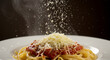 © Henrique - Detailed texture shot of grated Parmesan cheese falling onto pasta