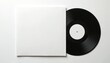 © Maryna - Minimalist illustration of blank white vinyl record sleeve next to black vinyl disc. Perfect for music promotion, album art, vintage design concepts. Clean white background offers ample space for