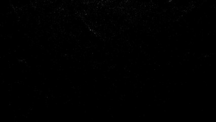 Wall Mural - Space stars background. Universe starry pattern with glowing stars. Abstract grainy texture isolated on black background. Top view. Dust, sand blow Silhouette of spread on the flat surface or table. 