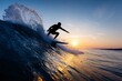 © avaye - Surfer gliding along wave at sunrise with water spray in arc shape