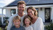 © Maksym - Close-up of joyful kids hugging their parents in front of a home with solar panels gleaming above. The sunny day casts soft shadows, highlighting the familyâs commitment to green e