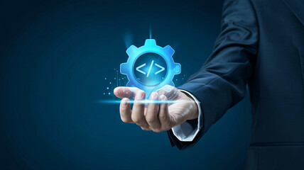 Professional holding digital gear icon representing software development and coding, innovation concept