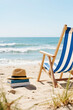© ArtFocus Studio - Beach chair with books and hat on sand near ocean. A serene view evoking relaxation and peace. Summer reading, vacation vibes, tranquil escape.