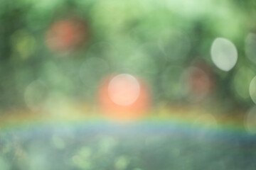 Wall Mural - Defocused natural green with red background. Abstract background.