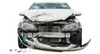 © Chanthakan - Damaged car front white sedan broken windshield crumpled hood exposed engine accident aftermath isolated on white background vehicle collision dramatic impact