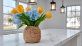 Yellow tulips and blue hyacinths in a woven vase on a marble countertop