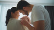 © ARTCORE STUDIO - Happy parents holding their newborn baby at home