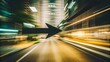 © myselfhafij - Black arrow moving forward on a blurred street, signifying speed and direction