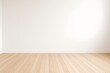 © Bangpi - Empty minimalist room with white wall and light wooden floor, bright natural lighting, perfect for interior design background or product mockup