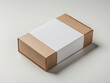 © HooSv - Cardboard box with a blank white paper sleeve for branding. Packaging mockup for a gift or shipping product.