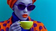 © Nataliia_Trushchenko - Woman wearing a colorful outfit and sunglasses is holding a green cup. The image has a vibrant and lively mood, with the woman's colorful attire