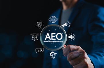 Wall Mural - AEO Answer Engine Optimization Strategy Concept. Businessman holding magnifying glass with AEO icons, representing artificial intelligence, chatbots, search optimization, and marketing strategy.
