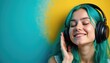 © Vadym - Young woman with turquoise hair enjoys music wearing headphones. Peaceful expression, closed eyes. Vibrant blue and yellow background creates atmosphere of joy and tranquility.