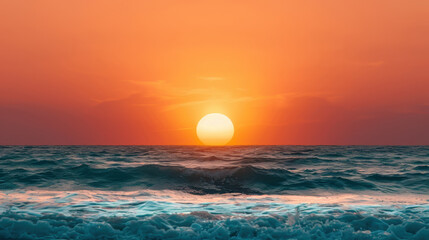 Wall Mural - Breathtaking sunset over ocean, with vibrant orange and yellow hues illuminating sky as sun dips below horizon, casting warm glow on gentle waves