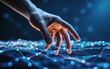 © Israt - Human hand touching glowing digital network lines technology