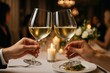 © Pixels Hunter - Elegant close-up of two hands toasting with white wine glasses in romantic candlelit dinner setting at upscale restaurant celebration. Ai generative