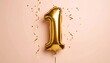 © Snabil - Gold balloon shaped like the number “1” surrounded by scattered gold confetti—set against a light background to highlight a first birthday or milestone celebration.