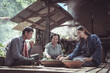 © pichet - Traditional Women Preparing Food Together in Rural Setting, Capturing Generational Bond and Cultural Heritage in Natural Environment
