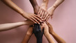 © Oksana_Latysheva - Hands of diverse people joined together forming a star. Symbol of unity; inclusion; teamwork and collective energy.