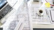 © Dylan - An overhead view of a creative workspace with abstract sketches, reflecting innovation and thoughtful planning.