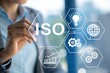 © MDSAJIB - Person interacting with iso certification and business process icons on a digital interface