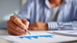 © nanskyblack - Business owner reviewing quarterly financial statements, performance evaluation. Accounting, fiscal health.