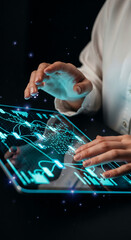 Wall Mural - hands interacting with a transparent tablet displaying glowing network data, symbolizing technologic