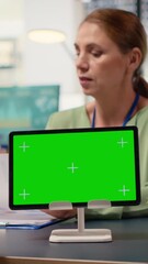Poster - Vertical Video Group of businesswomen reviews project analytics with green screen, empowered by data and team collaboration. Female colleagues reviewing digital content, graphs or reports. Camera B.