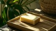 © Lonely Dragon - A serene image featuring a bar of soap on a bamboo tray, bathed in natural light, surrounded by green plants, creating a calming atmosphere.
