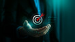 © Sutthiphong - Business goal setting and strategic success concept with businessman holding digital target icon and checklist, symbolizing planning, achievement, focus, and performance tracking for 2026 objectives