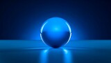 A reflective blue sphere sits on a surface, illuminated from below, casting a glow